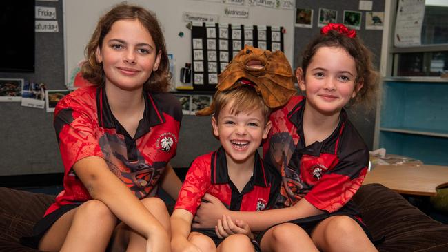 Halle, Stella, and Reuben Wedel are excited to start the 2024 school trip at Alawa Primary School. Picture: Pema Tamang Pakhrin