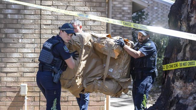 Police and Major Crime Detectives removing a wrapped armchair at the scene of an unexplained death in Felixstow last year. Picture: Roy VanDerVegt