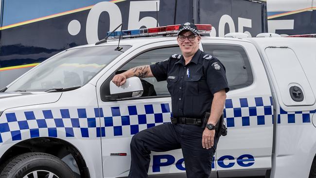 Leading Senior Constable Tom Weiher shows off the new Police divisional van. Picture: Jake Nowakowski