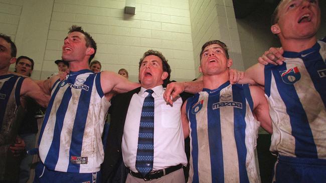 Denis Pagan and his Roos join in the chorus in 1999.