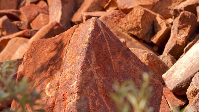 Carvings of spear tips on the Burrup Peninsula. Picture: Matthew Fallon