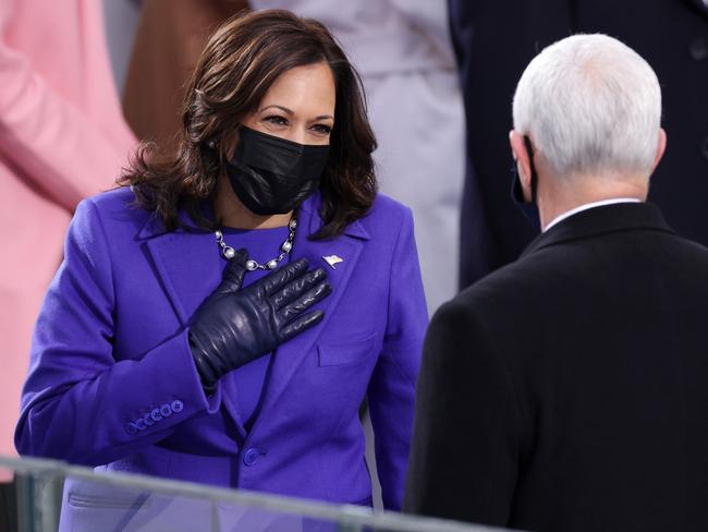 Kamala Harris greets Mike Pence at the inauguration. Picture: Getty Images.