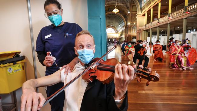 MSO concert master violinist Dale Barltrop receives his jab. Picture: David Caird