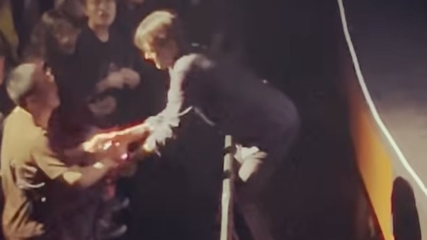 Videos of the incident showed Anderson snatching phones out of fans' hands. Picture: Instagram