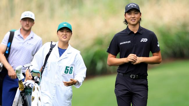 Minjee Lee caddied for her brother Min Woo at a Par Three Contest prior to the 2022 Masters. She would prefer to play as a team at a future Olympic Games. Picture: Getty Images