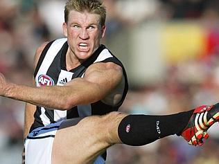  Nathan Buckley, the Collingwood football team captain, in action against Essendon during the Anzac Day clash at the MCG. Pic...