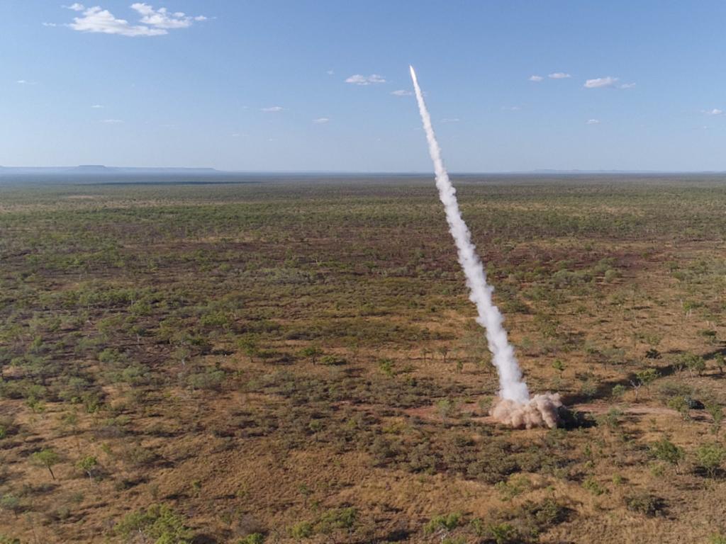 A United States Marine Corps M142 High Mobility Artillery Rocket System (HIMARS) demonstrating a guided rocket in Northern Territory.