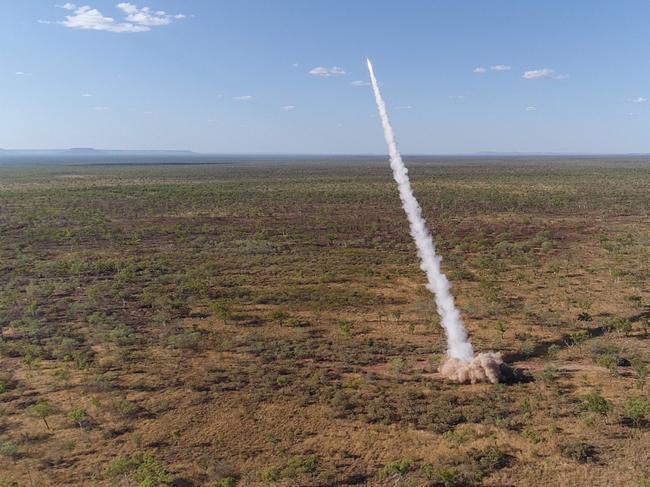 A United States Marine Corps M142 High Mobility Artillery Rocket System (HIMARS) demonstrating a guided rocket in Northern Territory.