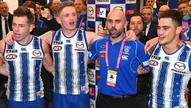 North players celebrate with Rhyce Shaw after their win against Richmond. Picture: Getty Images