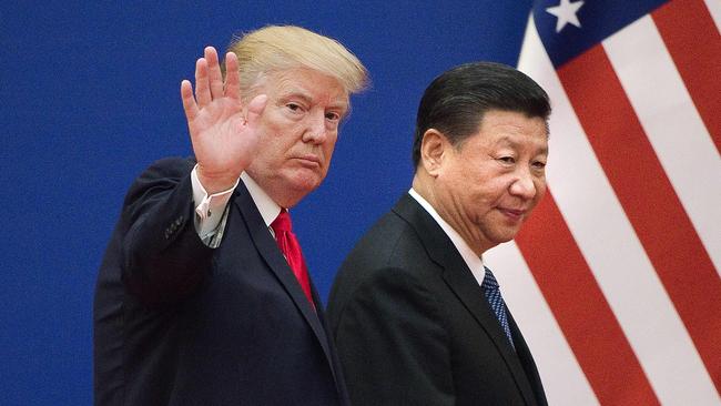 Donald Trump with China's President Xi Jinping. Given Trump’s overwhelming mandate, and his aggressive comments about China, Australia now risks being caught between two elephants. Picture: AFP