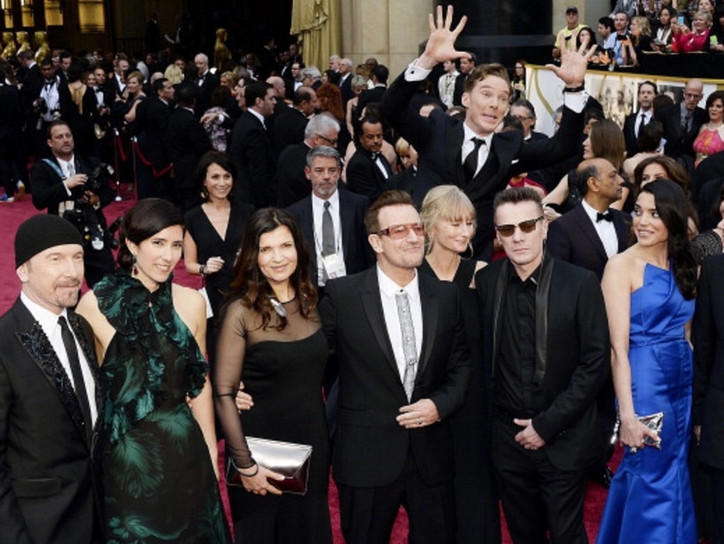 Benedict Cumberbatch photobombs the group photo of musicians The Edge, Bono, Larry Mullen, Jr. and Adam Clayton of U2 at the 86th Annual Academy Awards on March 2, 2014 in Hollywood, California. Picture: Getty