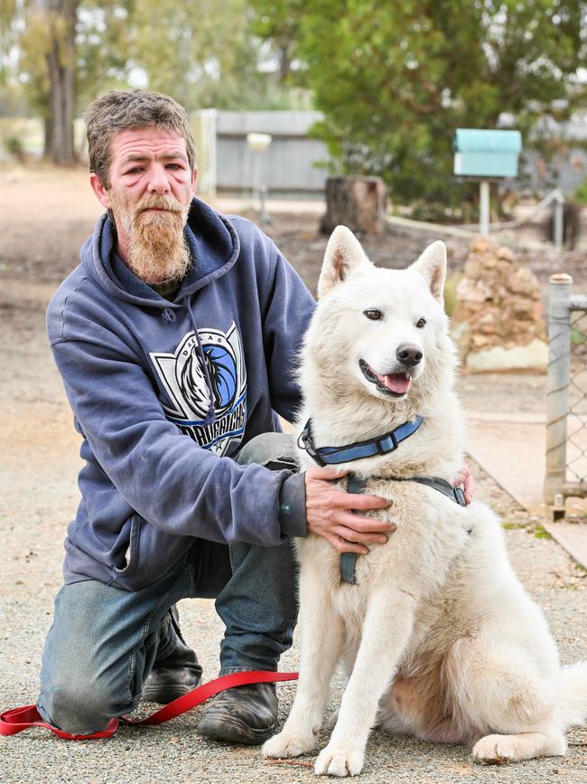 David Wallace, friend of Sean Ferris, with Buddy outside his Crystal Brook house. Picture: Brenton Edwards