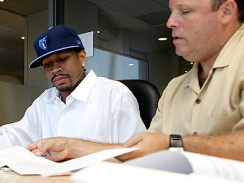 Leon Rose representing Allen Iverson as AI signs with the Memphis Grizzlies in 2009. Picture: Joe Murphy/NBAE/Getty Images