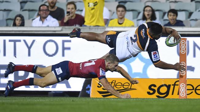 Folau Faingaa of the Brumbies attempts to score a try during the Round 8 Super Rugby match between the Brumbies and the Queensland Reds at GIO Stadium in Canberra, Saturday, April 7, 2018. (AAP Image/Lukas Coch) NO ARCHIVING, EDITORIAL USE ONLY