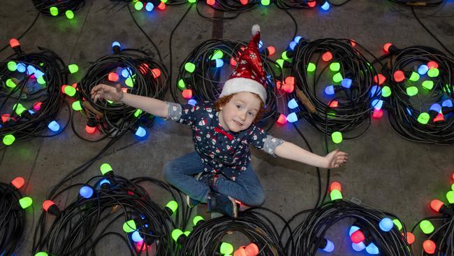 Vuk Miloseve, 6 at the Showtech Australia factory in Braeside where Christmas Lights are prepared Frankston’s Christmas Festival of Lights. The festival won’t go ahead this year but council has plans to make celebrations just as special. Picture: Andy Brownbill