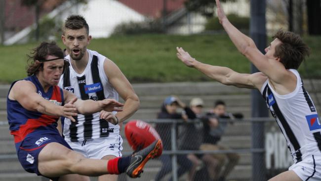 Coburg VFL midfielder Marcus Lentini snaps for goal against Collingwood. Picture: Jordan Zmood.