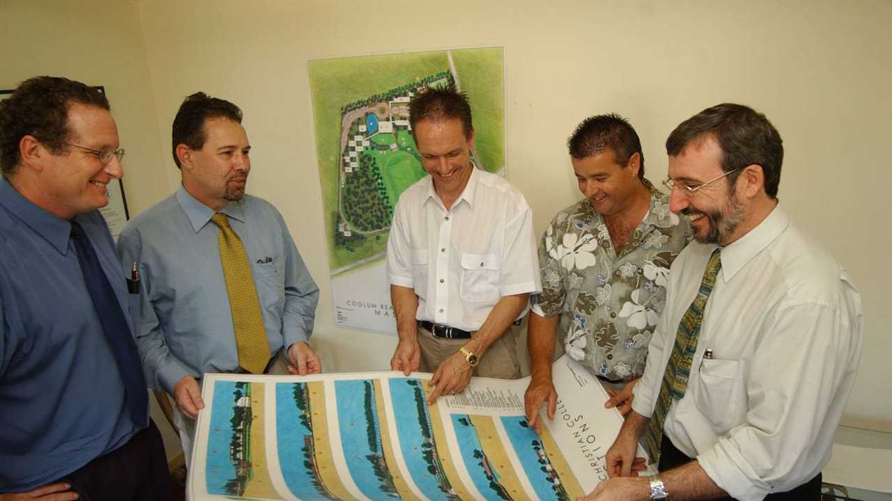 25/09/02 New Coolum Christian School Principal Chris Andrews, Steve Brassington , Pastor Steve Nichol, Rod Holt and Will Marcus with plans for the construction of the new school.