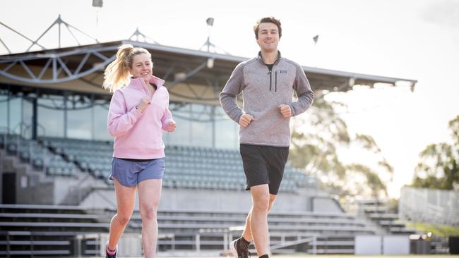 Georgia Nesbitt and Winter Challenge event director Tim Harmsen at the Domain Athletics Centre. Picture: Chris Kidd