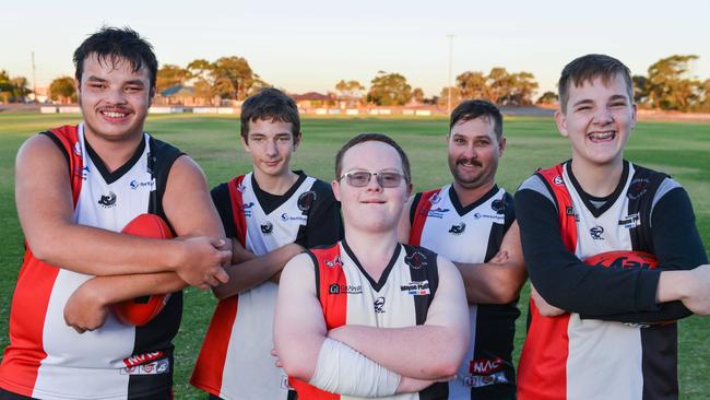 Christies Beach Football Club players (left to right) Josh Couch, Alex MacDonald, Josh Clavell, Ben Armstrong and Maison Paterson. The Saints have started an inclusive league team. Picture: Brenton Edwards