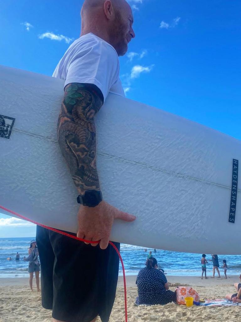 Duane now enjoys surfing every day. Picture: Supplied