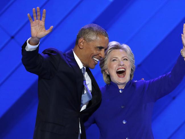 President Barack Obama and Democratic Presidential nominee Hillary Clinton wave to delegates after President Obama's speech during the third day of the Democratic National Convention in Philadelphia , Wednesday, July 27, 2016. (AP Photo/J. Scott Applewhite)