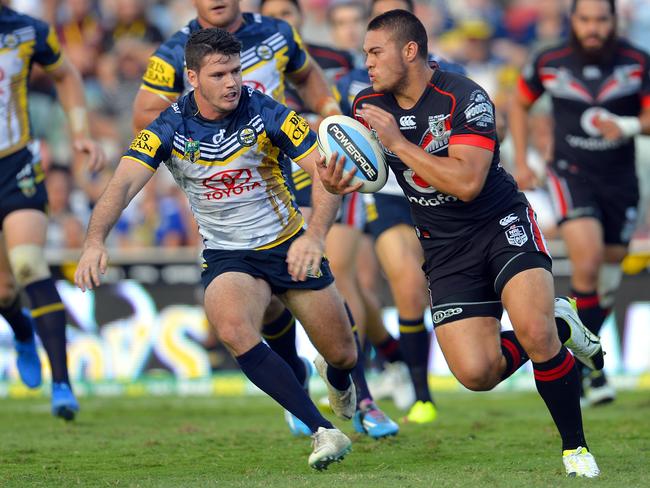 Warriors' Tuimoala Lolohea tries to evade Cowboy Lachlan Coote last season. Lolohea is worth $307,600. Picture: Wesley Monts