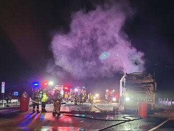 Dramatic images as fire engulfs truck on Pacific Highway