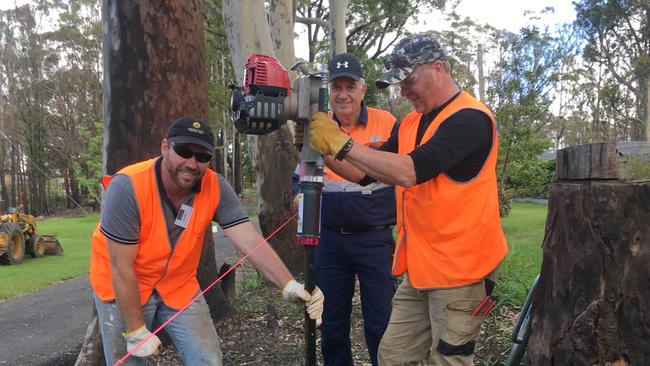 Milton BlazeAid volunteers Karl Vaivads, Brian Williamson and Carl Noone get to work on a Morton fence.