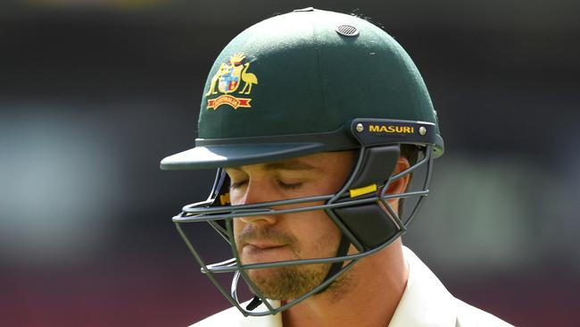 Australian batsman Travis Head is dejected after being dismissed  for 14 runs on day five of the first Test match between Australia and India at the Adelaide Oval in Adelaide, Monday, December 10, 2018. (AAP Image/Dave Hunt) NO ARCHIVING, EDITORIAL USE ONLY, IMAGES TO BE USED FOR NEWS REPORTING PURPOSES ONLY, NO COMMERCIAL USE WHATSOEVER, NO USE IN BOOKS WITHOUT PRIOR WRITTEN CONSENT FROM AAP