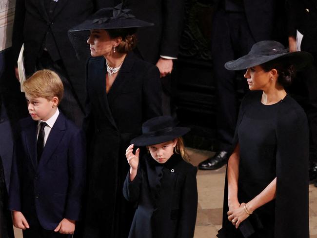 Catherine, Princess of Wales, with Prince George, Princess Charlotte and Meghan, Duchess of Sussex. Picture: Phil Noble/Getty Images