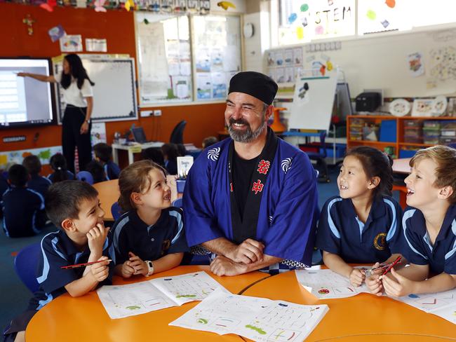 Jacob Santos, Tara Loughry, Peter White, Maya Nguyen Pham and Sebastian Mansour with Sensei Peter White. Picture: Sam Ruttyn