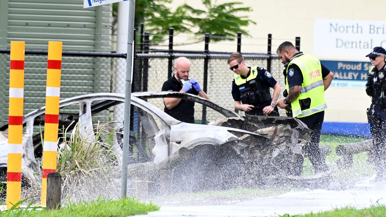 Two people were taken to hospital and the Tesla was destroyed in the crash. Picture: John Gass