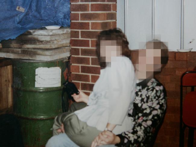 Guests at a party unwittingly sitting beside the dismembered body of Edwina Boyle hidden in the green barrel. Picture: Trezise Paul