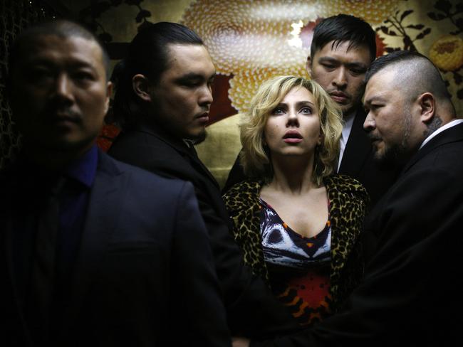 Johansson’s Lucy gets caught up with the wrong crowd in a scene from the film.