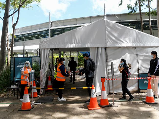 People pile into the Sydney Olympic Park Vaccination Centre on Saturday. Picture: NCA NewsWire/Bianca De Marchi