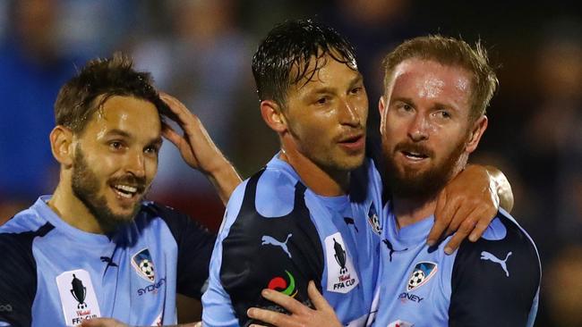 Sydney FC's David Carney (right) celebrates with Filip Holosko after scoring in the FFA Cup against Blacktown City.