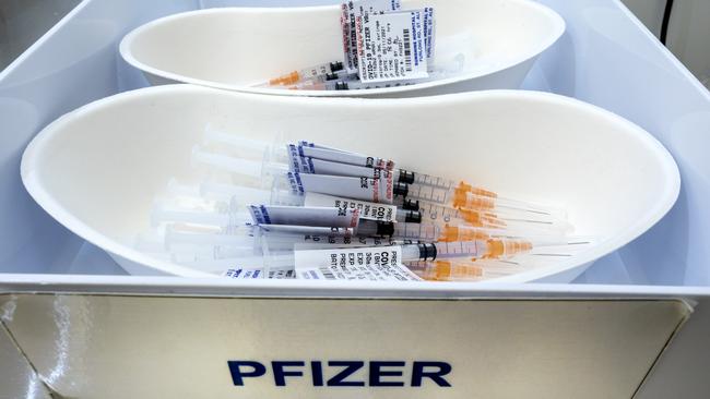 MELBOURNE, AUSTRALIA - NewsWire Photos NOVEMBER 5, 2021: Prepared doses of Pfizer vaccine at the vaccination Hub at the Melbourne Showgrounds as Australia is expected to pass the 80 percent  double vaxxed rate today. Picture: NCA NewsWire / David Geraghty