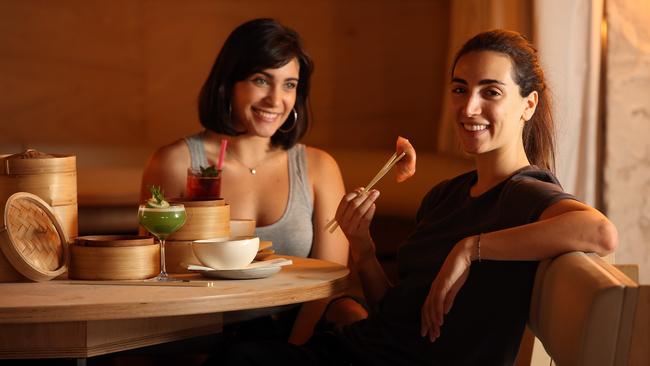 Marcella Angeline and Priscilla Doueihy enjoy dumplings and a DJ at Cha Li Boi restaurant at Eastern Suburbs Leagues Club, Bondi Junction. Picture: John Fotiadis