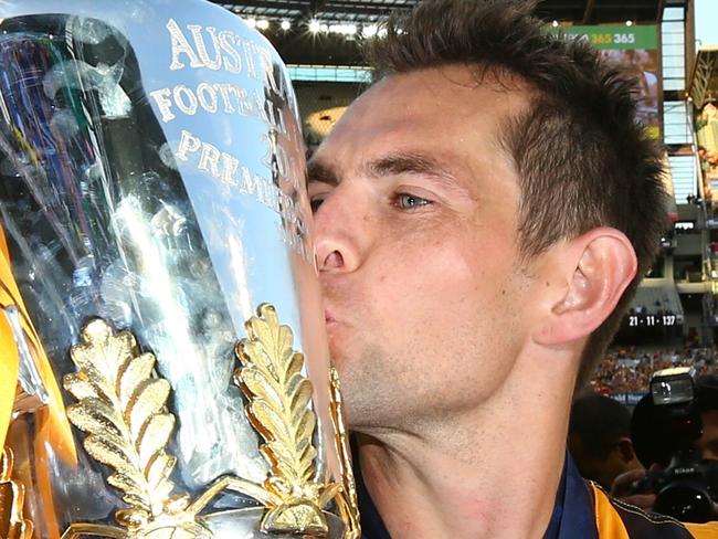 2014 AFL Grand Final match between Hawthorn Hawks and the Sydney Swans at the MCG Melbourne Cricket Ground on September 27, 2014. Luke Hodge kisses the cup. Picture: Michael Klein