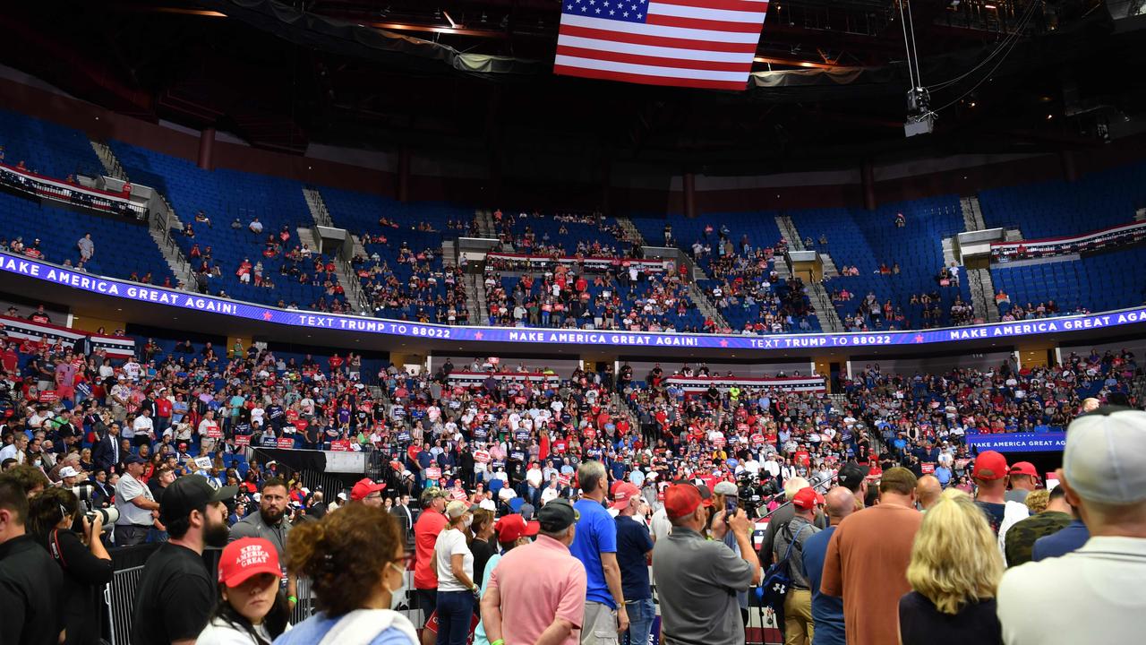 The upper section of the arena is seen partially empty as US President Donald Trump speaks. Picture: Nicholas Kamm / AFP