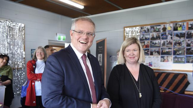 Prime Minister Scott Morrison (centre) and Liberal member for Bass Bridget Archer (right) visit the Ravenswood Starting Point Neighbourhood House in Launceston, Tasmania, Monday, July 8, 2019. (AAP Image/Sarah Rhodes)