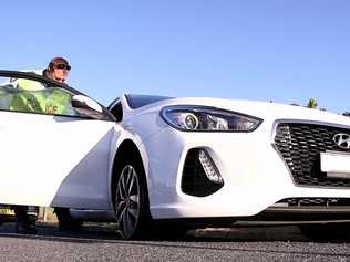 Officers from Coffs/Clarence Traffic and Highway Patrol following an alleged high speed pursuit which started at Glenugie and ended near the Big Banana at Coffs Harbour. Photo: Frank Redward