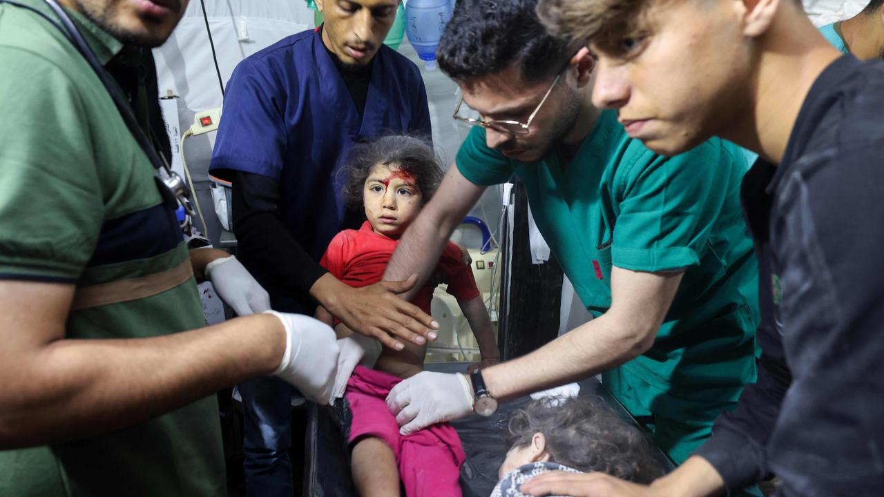 Children injured during Israeli bombardment receive treatment at the Kuwait Hospital in Rafah, on the southern Gaza Strip on April 20. Picture: MOHAMMED ABED / AFP