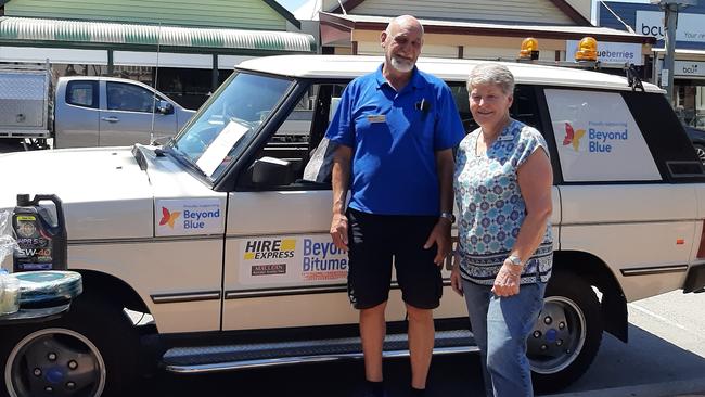 Chris and Janine Sparks prepare to draw the second of two raffles in support of Beyond Blue at Maclean, before leaving for the Beyond Blue (Beyond Bitumen) car rally through the back-roads of southern New South Wales.