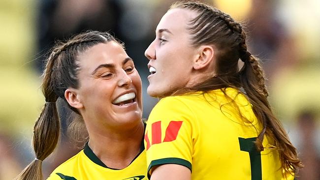 TOWNSVILLE, AUSTRALIA - OCTOBER 14: Jessica Sergis of the Jillaroos celebrates with Tamika Upton of the Jillaroos after she scored a try during the Womens Pacific Championship match between the Australia Jillaroos and New Zealand Kiwi Ferns at Queensland Country Bank Stadium on October 14, 2023 in Townsville, Australia. (Photo by Ian Hitchcock/Getty Images)