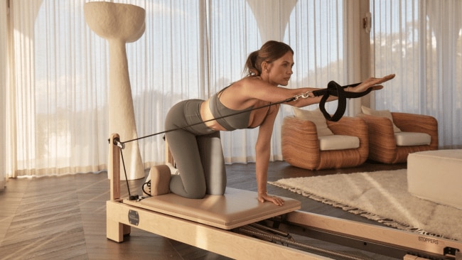 Thinking about investing in an at-home Reformer Pilates machine? Read this