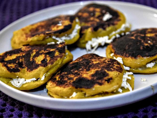 Arepas made with plantains in Caracas in Venezuela. Picture: AFP Photo/Juan Barreto