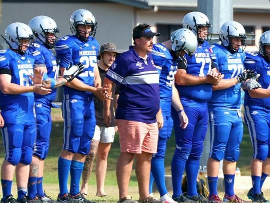 Mackay Mavericks coach Brad Somerville flanked by his troops. Picture: Mackay Gridiron Facebook/Steve McBride.