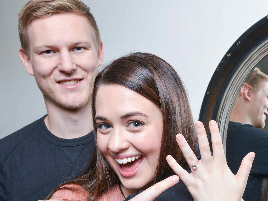 Moneysaver HQ national cover: Tessa Lomman with her affordable engagement ring and her husband Joel, Tuesday, June 25, 2019. (Pic: Brenton Edwards)