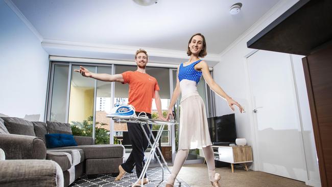 Ari Thompson practising at home with partner Georgia Swan. Picture: Nigel Hallett